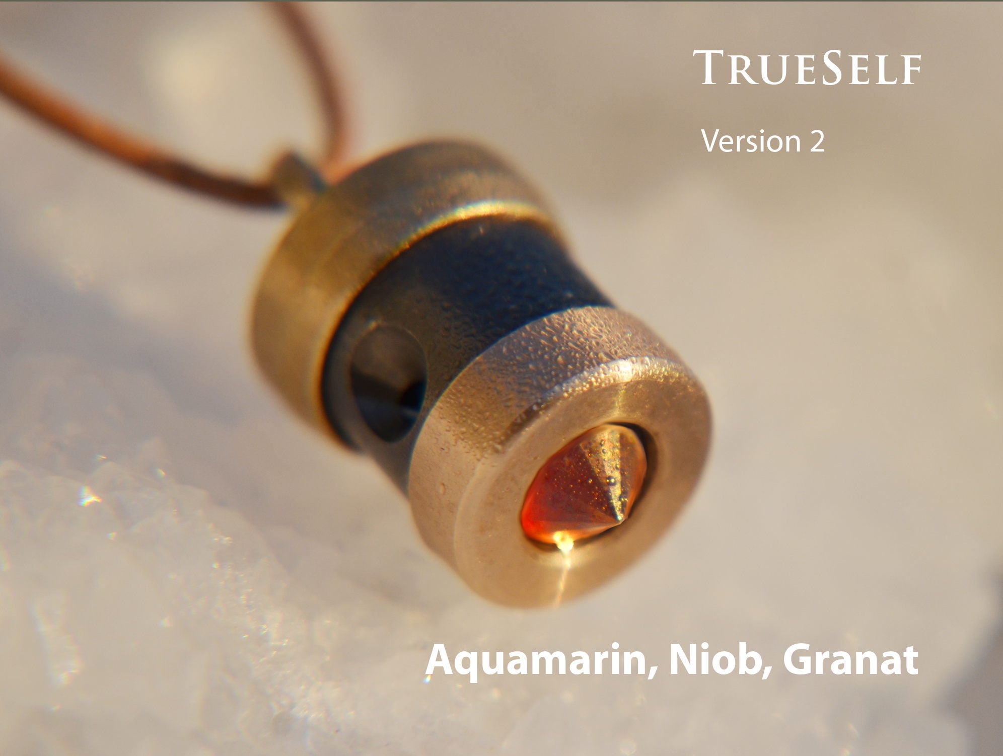 Herzkohärenz Kristallwirbel® Schmuckanhänger „True Self“ Bronze-Ruthenium | Aquamarin und Niob mit Granat/Bernstein